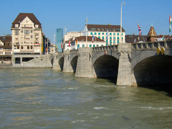 Bridges on the Rhine in Basel. The middle bridge 'Mittlere Brücke' and Kleinbasel with the Messeturm